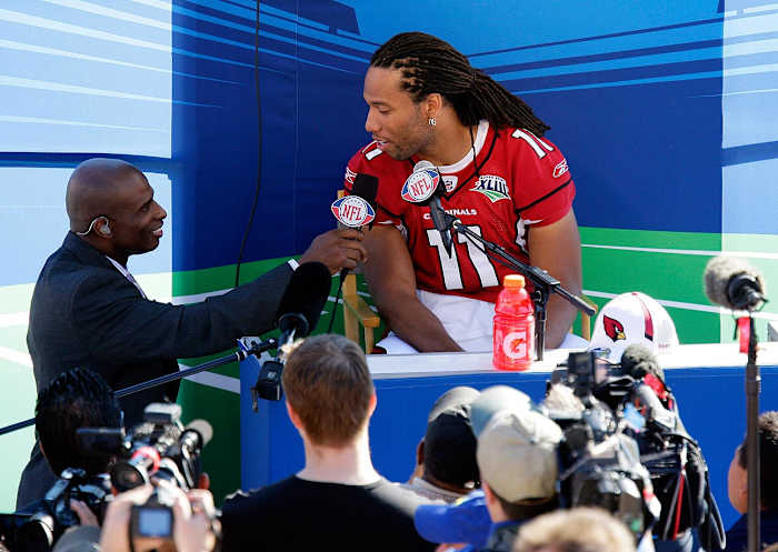 2009-Super-Bowl-XLIII-Media-Day-Deion-Sanders-Larry-Fitzgerald.jpg